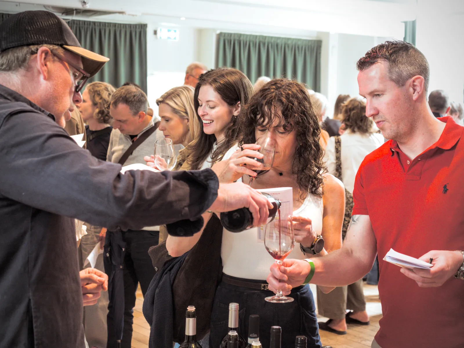Wine being poured at a tasting table at the Bollington Wine Fair 2026